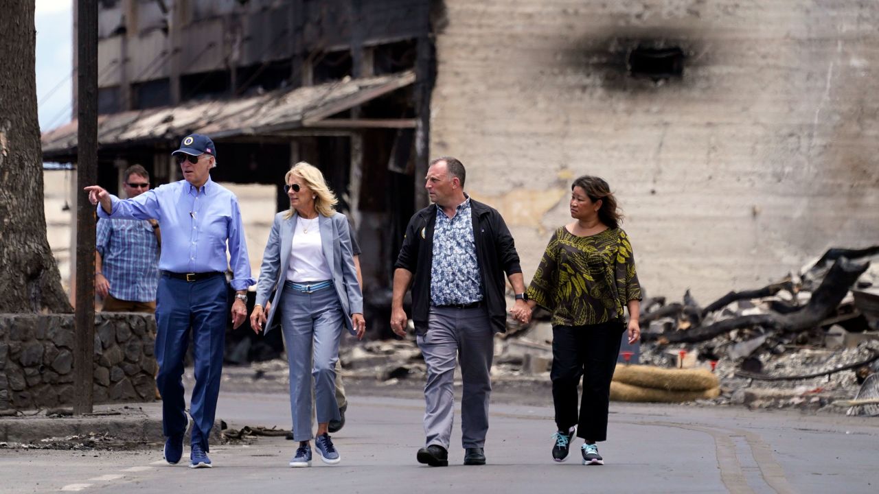 President Joe Biden and first lady Jill Biden walk with Hawaii Gov. Josh Green and his wife Jaime Green as they visit areas devastated by the Maui wildfires on Monday in Lahaina on the island of Maui in Hawaii.